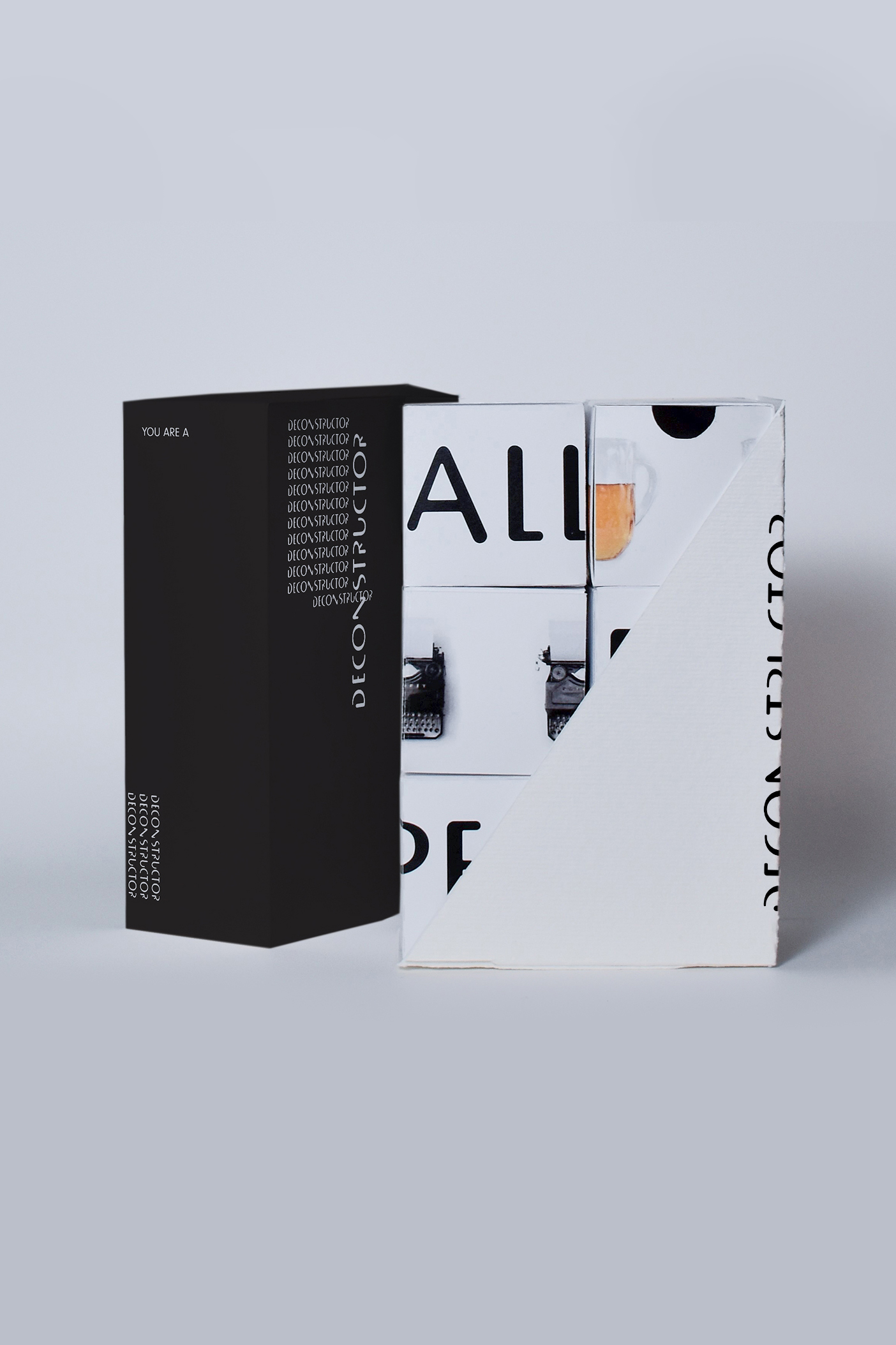 Deconstructivism Art Movement Game: Open game box with game pieces neatly stacked inside.